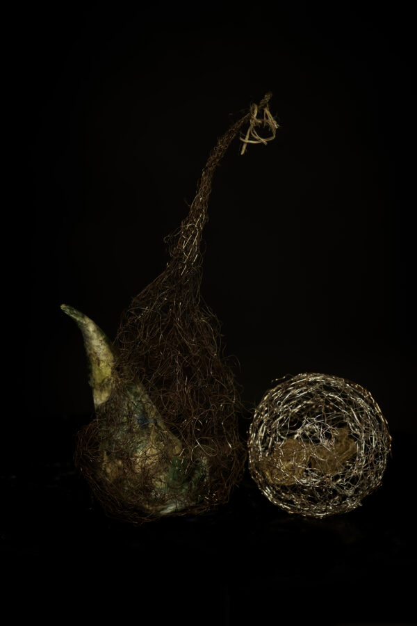wire nest and tissue paper bird