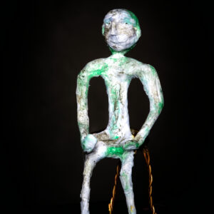 'I am' tissue paper figure on wire stool
